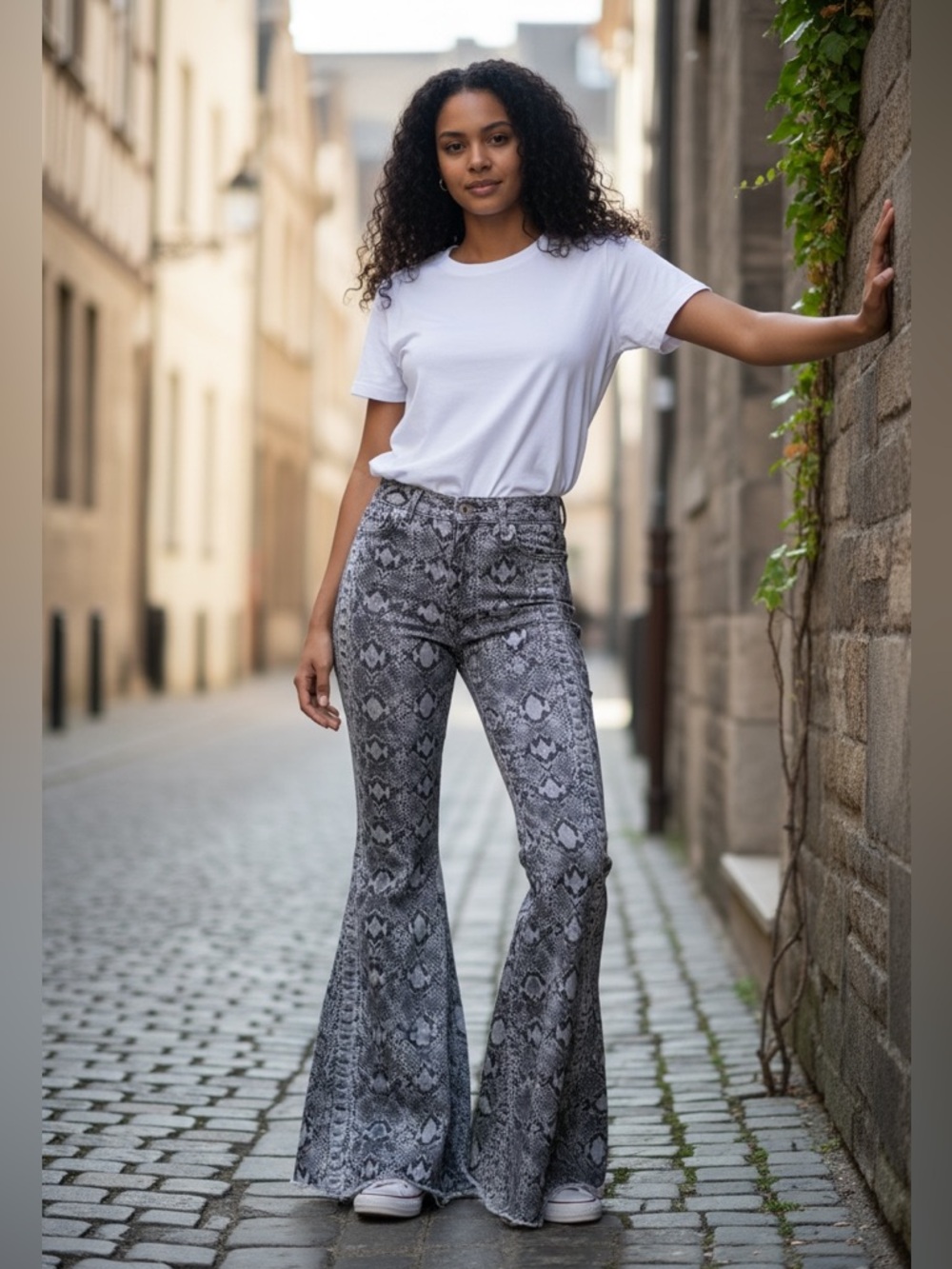 We The Free Gray Snake-Print Flare Jeans